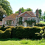 reddish house cob wall renovation